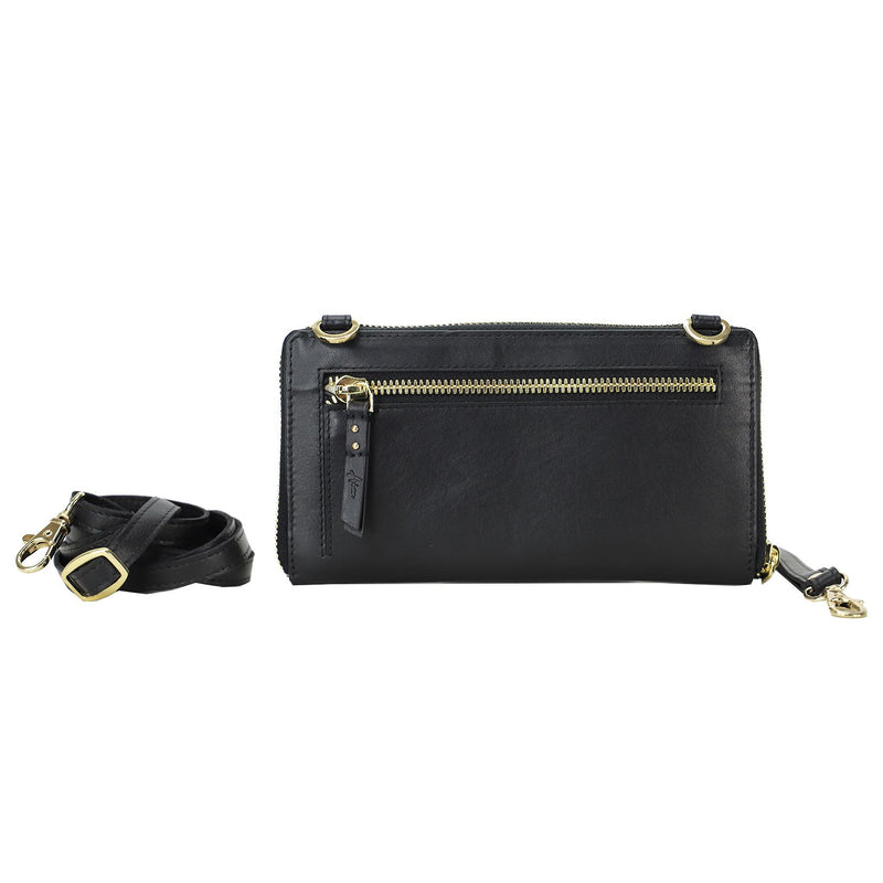 A lovely soft leather clutch, wallet or crossbody with ample card space, zip closure to the main body of the bag, outside zip and a front space with a flap for to keep your phone handy. A wrist is included along with a longer strap for shoulder or crossbody use. Measures 19cm x 10.5cm.  Comes boxed. Made by Adessa.