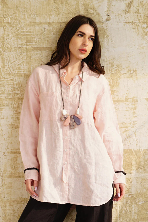 Collared neckline Relaxed Fit Button-up Pockets Detailing at sleeve cuff  Material: 100% Linen