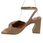 Made in Spain, these 9cm heels have an elegant, shapely block heel which is very stable and also interesting. The upper is supportive with a wide band of leather swirling across the foot. The narrow ankle strap crosses behind heel and the squared off footbed is padded for extra comfort. The colour could be described as a soft caramel.