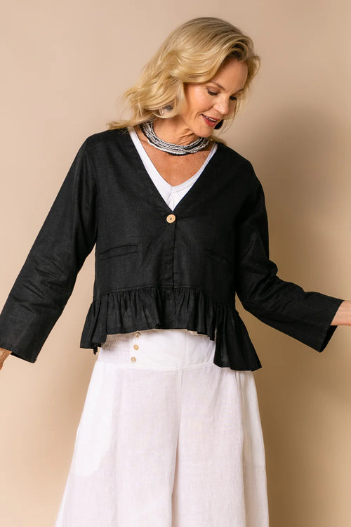 Embrace Romy: a bolero-style jacket that promises to elevate anything she is paired with. Romy features a single button closure and gathered frill hem for a touch of femininity. With sleeves and pockets, Romy offers both style and functionality. Whether you're layering over a sundress or adding flair to your casual ensemble, Romy is your next go-to for the summertime.  Bolero-style Single button closure Gathered frill hem Pockets Material: 45% Cotton/55% Linen  Designed in Australia