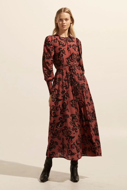 The Tangent offers an elegant option for autumnal dressing. Crafted in our custom print ochre floral it takes its starting point from vintage aesthetics but translates as both modern and wearable. A rounded neckline has delicate covered buttons and a gathered shoulder seam lead into a dramatic gathered feature sleeve that finishes neatly in a deep shirred cuff.&nbsp;