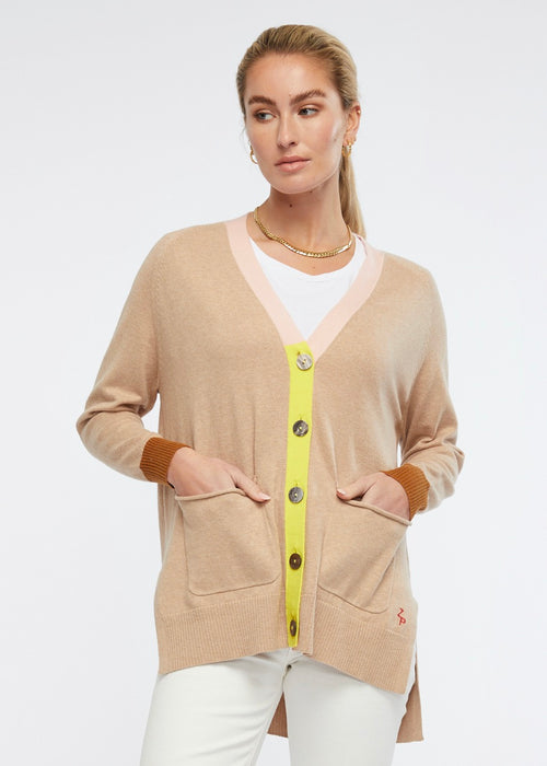 Colourful, relaxed and versatile, the College Cardi is the perfect weekend knit. A part of our Z&amp;P Essentials range, this piece is what the name suggests, an essential in everyone's wardrobe! Its feature colours make this piece stand out from the rest . With two spacious pockets for added practicality, ribbed cuffs and split hem, this knit is designed with the ultimate comfort in mind.&nbsp;