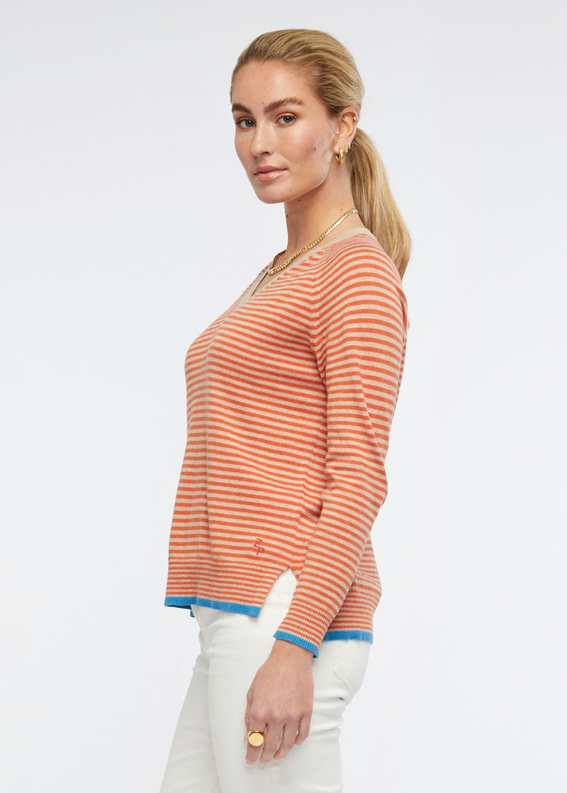 A Z&P take on a classic style, the Essential Stripe V. A crowd favourite (and ours too), flattering and fun stripes adorn this loosely structured V neck knit, which fits neatly on the body. Delicate ribbing details make this piece perfect for almost any, and every, occasion. Subtlety hand embroidered with our  ZP essentials logo, this piece is designed to compliment your wardrobe and be worn with love. The cotton cashmere bend makes this piece soft to the touch and comfy to wear. 