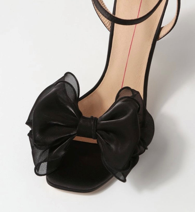 All eyes are on you in these sassy satin heels by Mollini. A square toe and frothy tulle make DAPHNE a feminine design fit for dinner dates and red carpets.