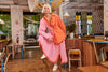 The Barry Made Davy Skirt is knitted for a light springy handle with tactile ribs that create the effect of rippling pleats for beautiful movement and volume. It's a versatile skirt, in vibrant pink with tangerine orange trims around the hem for all lovers of colour! Detailed with a small split at the front and a comfortable elastic waistband.  Composition: Viscose/Nylon