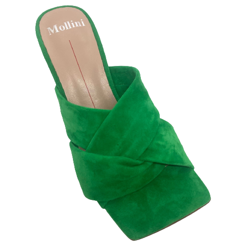 This fabulous colour of emerald green is styled in the perfect shoe. The soft suede used in the wide straps across the foot offers comfort and support while the square toe and squared off hour glass shaped heel add the perfect amount of "quirky". These slides will add spark to the dullest of outfits and can be worn with pants, skirts, denim, racewear and evening wear. A great addition to any wardrobe.