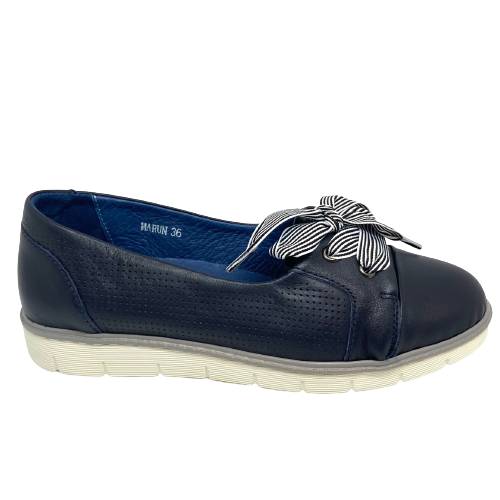 This is a almost a sneaker. It is very comfortable with it's removeable insole and comfortable cushioning, and has smart striped ribbon laces but it is slightly lower cut than a sneaker. Available in navy leather and the ribbon laces are navy and white stripe.