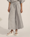 Comfortably chic and quintessentially stylish. These light grey linen pants convey effortless elegance.The cropped length and wide leg fitmean you can pair with flats for a leisurely look or upgrade the look from day to night witha strappy sandal. A gathered drawstring waist flatters every figure, A relaxed fit, with just a hint of tailoring.