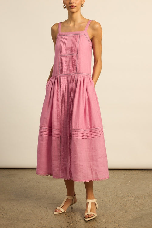 ut in ramie with a colour-matched lining, the Altitude dress offers a relaxed and effortless aesthetic. A squared neckline is framed with delicate ladder lace, while the gathered skirt adds movement.&nbsp;

100% ramie with colour-matched lining
squared neckline with ladder-lace detail
gathered skirt for movement with scalloped lace hem finish
a soft pink hue, fresh and on-trend for summer styling.