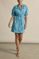 crafted in cotton, the aspect dress combines a dynamic 3D floral broderie with a scalloped lace neckline finish. A piece designed for elevated and romantic summer dressing.

100% cotton, trims: 100% polyester 
Covered buttons running from neckline to hem
Fabric covered belt with brass ends for versatile styling options 
Elbow length raglan sleeve 
3d floral broderie finish adds a sense of feminine charm 
Mini-length finishing mid-thigh