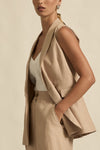 fused 100% linen outer with 100% cotton lining
sleeveless, double-breasted silhouette
v-neckline with welt pocket detailing
centre-back vent for a neat fit
polished tailoring with contemporary ease
pairs perfectly with the heed pant for elevated set dressing