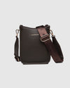 The Louenhide Parker Phone Crossbody Bag effortlessly combines an elevated aesthetic with everyday functionality. Whether you're heading to the office, running errands or meeting friends for coffee, this minimalistic phone bag will be your new go-to. Parker features an on-trend and modern silhouette, enhanced by the contrasting stitch details in three classic colour ways. Elevate your style with the sateen webbing guitar strap or keep it simple with the matching vegan leather crossbody strap. Keeping your e