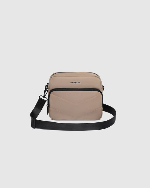 nternal Features	Zip Pocket, Slip Pocket
External Features	Front Side Zip Pocket, Back Side Zip Pocket
Internal Lining	Polyester Recycled Black and White Stripe Logo 100% Lining
Crossbody Strap	Adjustable and Detachable 80-145cm Sateen Strap
Closure	Secure Zip
Body Material	Satin Finish Polyurethane 100%
Hardware	Black
Dimensions	W23 x H19 x D9cm
Weight	0.55kg
