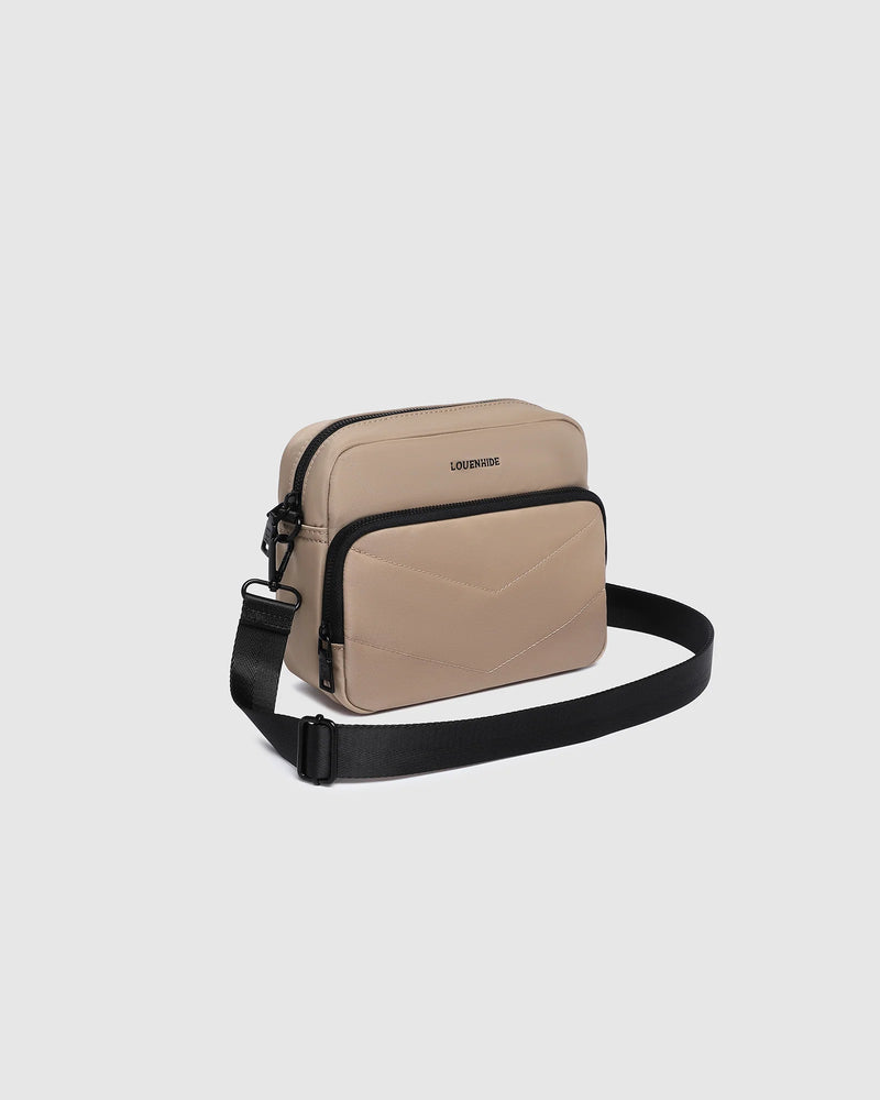 nternal Features	Zip Pocket, Slip Pocket
External Features	Front Side Zip Pocket, Back Side Zip Pocket
Internal Lining	Polyester Recycled Black and White Stripe Logo 100% Lining
Crossbody Strap	Adjustable and Detachable 80-145cm Sateen Strap
Closure	Secure Zip
Body Material	Satin Finish Polyurethane 100%
Hardware	Black
Dimensions	W23 x H19 x D9cm
Weight	0.55kg
