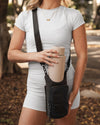 The Louenhide Miami Water Bottle Bag is a sleek, hands-free essential for an active, on-the-go lifestyle. With its slim, modern silhouette, this nylon water bottle crossbody bag is designed for effortless movement while keeping your water bottle secure and within reach (yes, it will even fit a 1L Frank Green!). Not just for hydration, the Miami features a convenient compartment to secure your phone and keys – so you’re ready to tackle the day without the bulk. Whether you’re heading out for a morning walk, 
