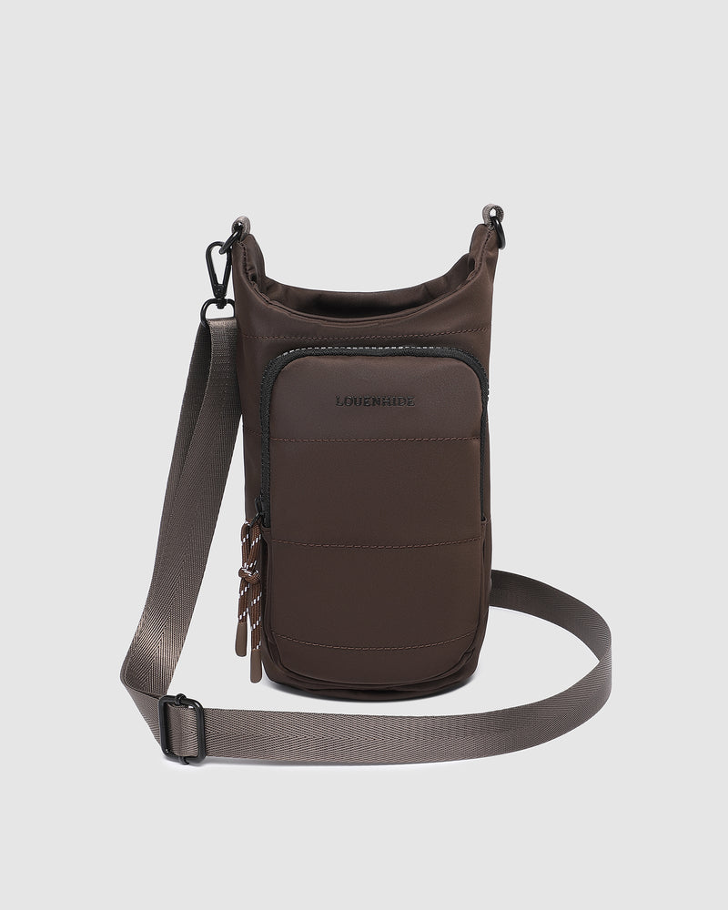The Louenhide Miami Water Bottle Bag is a sleek, hands-free essential for an active, on-the-go lifestyle. With its slim, modern silhouette, this nylon water bottle crossbody bag is designed for effortless movement while keeping your water bottle secure and within reach (yes, it will even fit a 1L Frank Green!). Not just for hydration, the Miami features a convenient compartment to secure your phone and keys – so you’re ready to tackle the day without the bulk. Whether you’re heading out for a morning walk, 