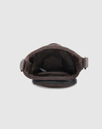 The Louenhide Miami Water Bottle Bag is a sleek, hands-free essential for an active, on-the-go lifestyle. With its slim, modern silhouette, this nylon water bottle crossbody bag is designed for effortless movement while keeping your water bottle secure and within reach (yes, it will even fit a 1L Frank Green!). Not just for hydration, the Miami features a convenient compartment to secure your phone and keys – so you’re ready to tackle the day without the bulk. Whether you’re heading out for a morning walk, 