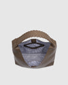 The Louenhide Avery Mocha Shoulder Bag is a modern take on the classic hobo bag with an elevated twist. The whipstitch detailing adds depth and texture to the shoulder bags exterior while the slouchy, minimalistic design adds a soft yet sleek element to your capsule wardrobe. The seamless teardrop silhouette sits comfortably over the shoulder, while offering ample interior space to fit your everyday essentials and more. With its timeless blend of structure and softness, elevate your everyday with the Avery 