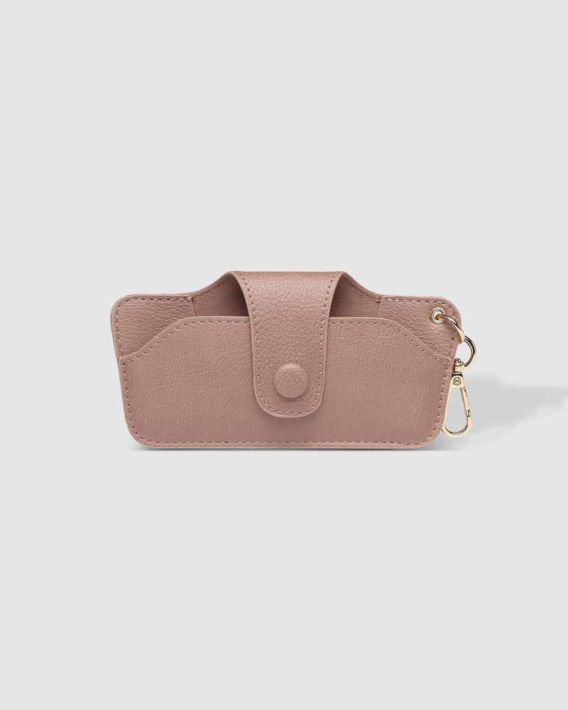 The Louenhide Skittle Sunglass Case is the perfect blend of style and functionality for your everyday eyewear. For ultimate convenience, effortlessly attach to your keys or handbag with the light gold hardware keyring clasp. Without compromising on style, the exterior features a gorgeous vegan leather, while the interior is lined with soft suede material to keep your everyday eyewear protected. Whether it's your favourite sunglasses or your reading glasses, they will stay protected and safe with the secure 