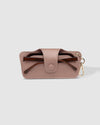 The Louenhide Skittle Sunglass Case is the perfect blend of style and functionality for your everyday eyewear. For ultimate convenience, effortlessly attach to your keys or handbag with the light gold hardware keyring clasp. Without compromising on style, the exterior features a gorgeous vegan leather, while the interior is lined with soft suede material to keep your everyday eyewear protected. Whether it's your favourite sunglasses or your reading glasses, they will stay protected and safe with the secure 