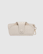 The Louenhide Skittle Sunglass Case is the perfect blend of style and functionality for your everyday eyewear. For ultimate convenience, effortlessly attach to your keys or handbag with the light gold hardware keyring clasp. Without compromising on style, the exterior features a gorgeous vegan leather, while the interior is lined with soft suede material to keep your everyday eyewear protected. Whether it's your favourite sunglasses or your reading glasses, they will stay protected and safe with the secure 