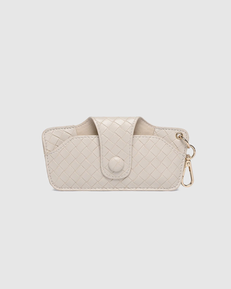 The Louenhide Skittle Sunglass Case is the perfect blend of style and functionality for your everyday eyewear. For ultimate convenience, effortlessly attach to your keys or handbag with the light gold hardware keyring clasp. Without compromising on style, the exterior features a gorgeous vegan leather, while the interior is lined with soft suede material to keep your everyday eyewear protected. Whether it's your favourite sunglasses or your reading glasses, they will stay protected and safe with the secure 