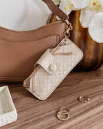 The Louenhide Skittle Sunglass Case is the perfect blend of style and functionality for your everyday eyewear. For ultimate convenience, effortlessly attach to your keys or handbag with the light gold hardware keyring clasp. Without compromising on style, the exterior features a gorgeous vegan leather, while the interior is lined with soft suede material to keep your everyday eyewear protected. Whether it's your favourite sunglasses or your reading glasses, they will stay protected and safe with the secure 