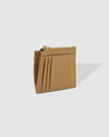 The Louenhide Cara Cardholder is a sleek and functional accessory, designed for everyday use. This cute card wallet features a central zip coin pocket, two note pockets and six cardholder spots. Find the perfect colour for you, choosing between a classic neutral, metallic or summer brights. Easily fit this cardholder style in your favourite Louenhide crossbody bag or if carry in your back pocket if you're a minimalist on the go!