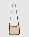 nternal Features	Zip Pocket, Slip Pocket
Internal Lining	Polyester Recycled Beige and White Stripe Logo 100% Lining
Shoulder Strap	Adjustable and Non-Detachable 63-145cm Shoulder Strap
Closure	Secure Zip
Body Material	Raffia 100%
Hardware	Light Gold
Dimensions	W22 x H19.5 x D11cm
Weight	0.562kg
