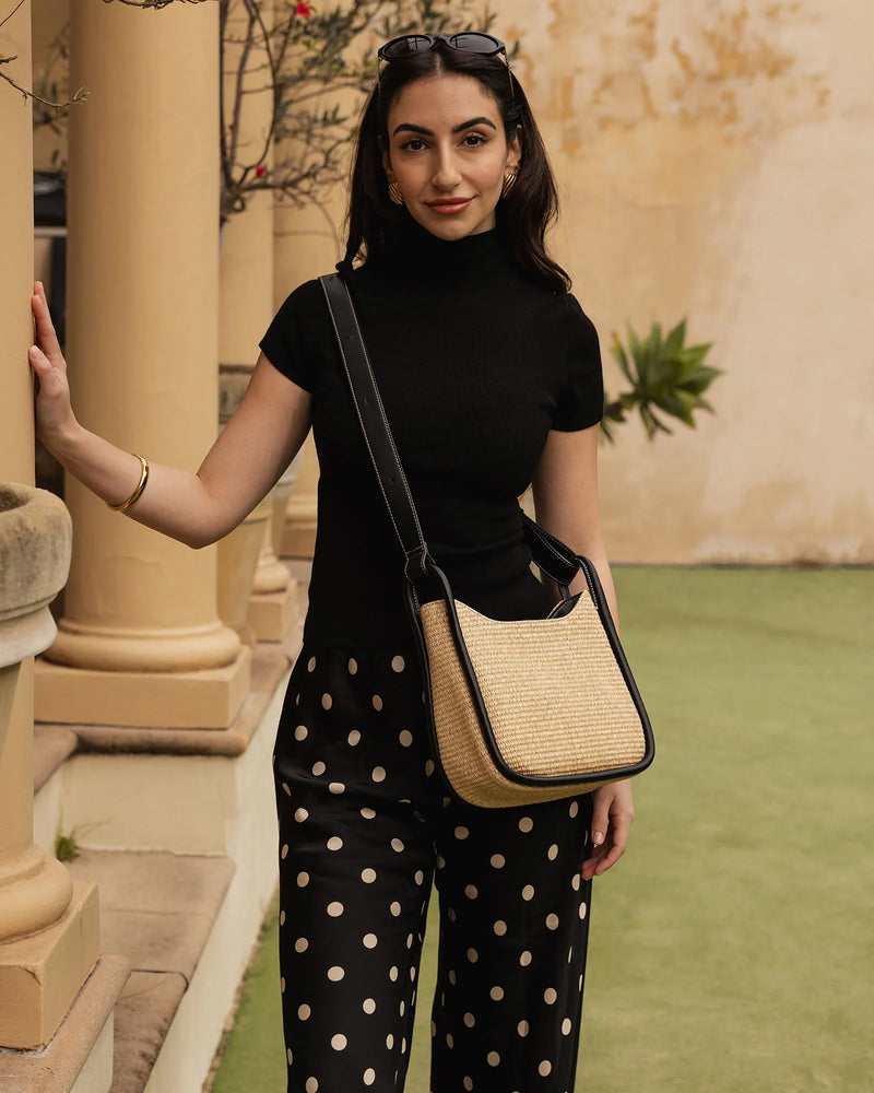 nternal Features	Zip Pocket, Slip Pocket
Internal Lining	Polyester Recycled Beige and White Stripe Logo 100% Lining
Shoulder Strap	Adjustable and Non-Detachable 63-145cm Shoulder Strap
Closure	Secure Zip
Body Material	Raffia 100%
Hardware	Light Gold
Dimensions	W22 x H19.5 x D11cm
Weight	0.562kg
