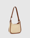 nternal Features	Zip Pocket, Slip Pocket
Internal Lining	Polyester Recycled Beige and White Stripe Logo 100% Lining
Shoulder Strap	Adjustable and Non-Detachable 63-145cm Shoulder Strap
Closure	Secure Zip
Body Material	Raffia 100%
Hardware	Light Gold
Dimensions	W22 x H19.5 x D11cm
Weight	0.562kg
