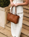Internal Lining	Polyurethane Vegan Leather 100% Backing
Handle Height	25cm
Closure	Magnetic Clasp
Body Material	Polyurethane Vegan Leather 100%
Hardware	Light Gold
Dimensions	W38 x H21 x D10cm
Weight	0.67kg