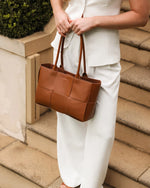 Internal Lining	Polyurethane Vegan Leather 100% Backing
Handle Height	25cm
Closure	Magnetic Clasp
Body Material	Polyurethane Vegan Leather 100%
Hardware	Light Gold
Dimensions	W38 x H21 x D10cm
Weight	0.67kg