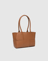 Internal Lining	Polyurethane Vegan Leather 100% Backing
Handle Height	25cm
Closure	Magnetic Clasp
Body Material	Polyurethane Vegan Leather 100%
Hardware	Light Gold
Dimensions	W38 x H21 x D10cm
Weight	0.67kg