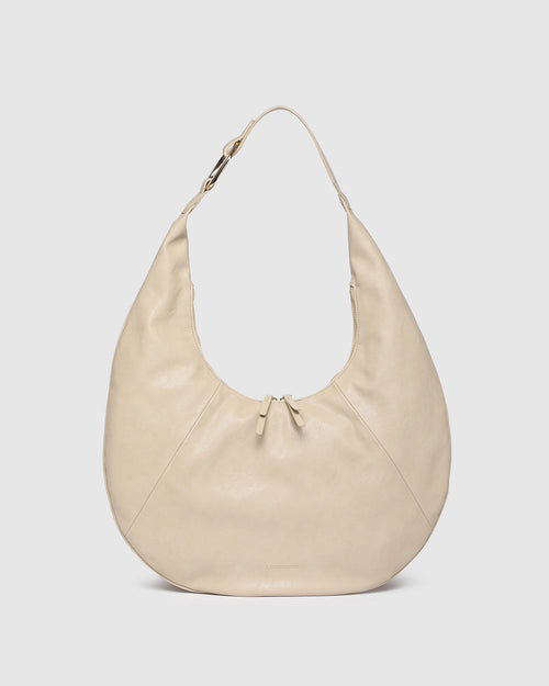 Internal Features	Zip Pocket, Slip Pocket
Internal Lining	Polyester Recycled Black and White Stripe Logo 100% Lining
Handle Height	34cm
Closure	Secure Zip
Body Material	Polyurethane Vegan Leather 100%
Hardware	Light Gold
Dimensions	W47 x H27 x D1cm (expands to 23cm deep)
Weight	0.45kg
