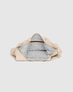 Internal Features	Zip Pocket, Slip Pocket
Internal Lining	Polyester Recycled Black and White Stripe Logo 100% Lining
Handle Height	34cm
Closure	Secure Zip
Body Material	Polyurethane Vegan Leather 100%
Hardware	Light Gold
Dimensions	W47 x H27 x D1cm (expands to 23cm deep)
Weight	0.45kg
