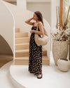 Internal Features	Zip Pocket, Slip Pocket
Internal Lining	Polyester Recycled Black and White Stripe Logo 100% Lining
Handle Height	34cm
Closure	Secure Zip
Body Material	Polyurethane Vegan Leather 100%
Hardware	Light Gold
Dimensions	W47 x H27 x D1cm (expands to 23cm deep)
Weight	0.45kg
