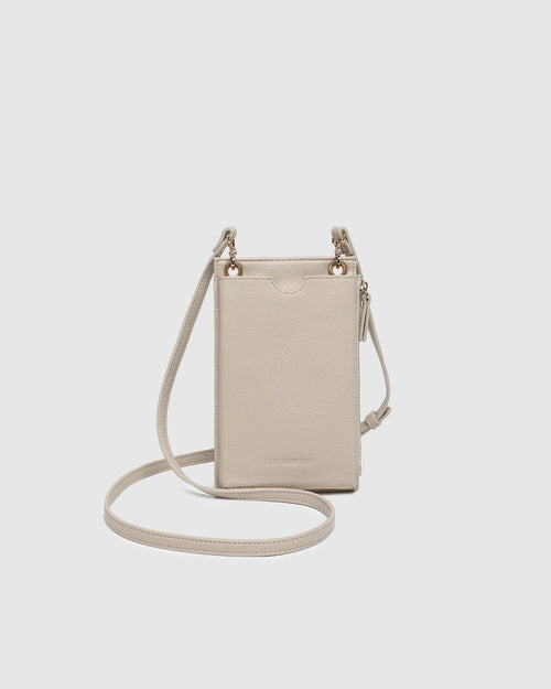 The Louenhide Suki Phone Bag is the perfect piece for your grab-and-go moments. With a sleek silhouette that comfortably fits up-to an iPhone Pro Max, this phone crossbody bag keeps your essentials streamlined and within reach. Whether you’re running errands or heading out for a quick coffee, the Suki mini crossbody bag moves effortlessly with you, wherever the day leads.&nbsp;