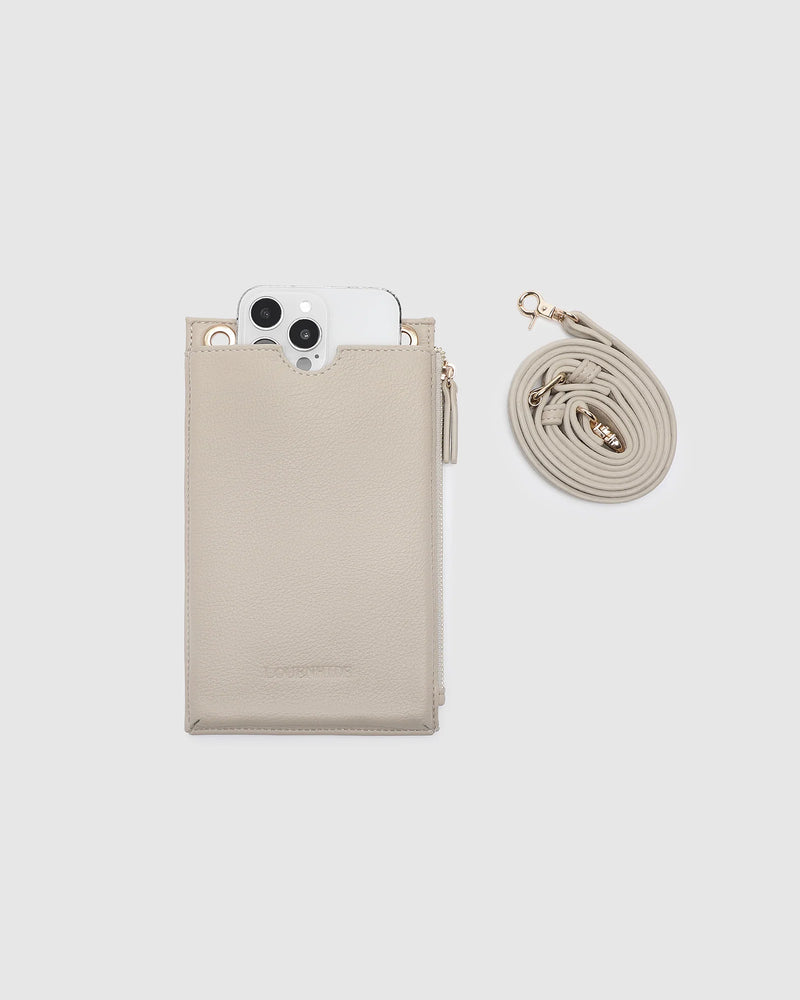 The Louenhide Suki Phone Bag is the perfect piece for your grab-and-go moments. With a sleek silhouette that comfortably fits up-to an iPhone Pro Max, this phone crossbody bag keeps your essentials streamlined and within reach. Whether you’re running errands or heading out for a quick coffee, the Suki mini crossbody bag moves effortlessly with you, wherever the day leads.&nbsp;