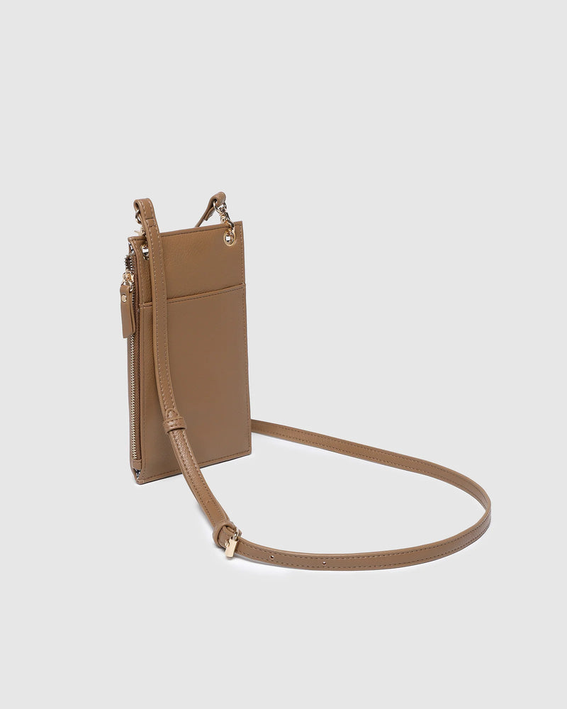 The Louenhide Suki Phone Bag is the perfect piece for your grab-and-go moments. With a sleek silhouette that comfortably fits up-to an iPhone Pro Max, this phone crossbody bag keeps your essentials streamlined and within reach. Whether you’re running errands or heading out for a quick coffee, the Suki mini crossbody bag moves effortlessly with you, wherever the day leads.&nbsp;