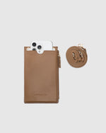 The Louenhide Suki Phone Bag is the perfect piece for your grab-and-go moments. With a sleek silhouette that comfortably fits up-to an iPhone Pro Max, this phone crossbody bag keeps your essentials streamlined and within reach. Whether you’re running errands or heading out for a quick coffee, the Suki mini crossbody bag moves effortlessly with you, wherever the day leads.&nbsp;