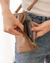 The Louenhide Suki Phone Bag is the perfect piece for your grab-and-go moments. With a sleek silhouette that comfortably fits up-to an iPhone Pro Max, this phone crossbody bag keeps your essentials streamlined and within reach. Whether you’re running errands or heading out for a quick coffee, the Suki mini crossbody bag moves effortlessly with you, wherever the day leads.&nbsp;