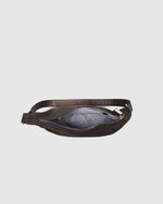 Internal Features	2 Slip Pockets
Internal Lining	Polyester Recycled Black and White Stripe 100% Lining
Guitar Strap	Adjustable and Non-Detachable 34-65cm Logo Guitar Strap
Closure	Secure Zip
Body Material	Nylon 100%
Hardware	Light Gold
Dimensions	W29 x H15.5 x D10cm
Weight	0.3kg