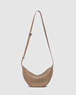 Internal Features	2 Slip Pockets
Internal Lining	Polyester Recycled Black and White Stripe 100% Lining
Crossbody Strap	Adjustable and Non-Detachable 34-65cm Vegan Leather Strap
Closure	Secure Zip
Body Material	Polyurethane Vegan Leather 100%
Hardware	Light Gold
Dimensions	W29 x H15.5 x D10cm
Weight	0.3kg