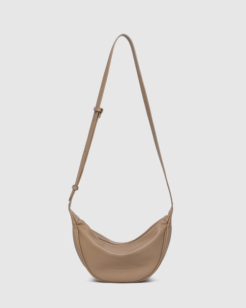 Internal Features	2 Slip Pockets
Internal Lining	Polyester Recycled Black and White Stripe 100% Lining
Crossbody Strap	Adjustable and Non-Detachable 34-65cm Vegan Leather Strap
Closure	Secure Zip
Body Material	Polyurethane Vegan Leather 100%
Hardware	Light Gold
Dimensions	W29 x H15.5 x D10cm
Weight	0.3kg