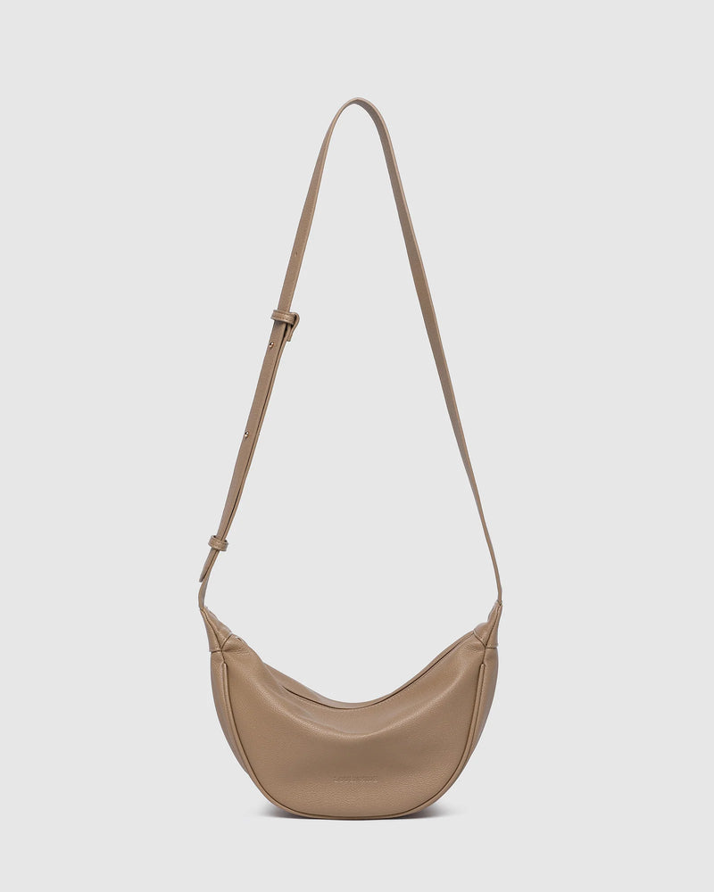 Internal Features	2 Slip Pockets
Internal Lining	Polyester Recycled Black and White Stripe 100% Lining
Crossbody Strap	Adjustable and Non-Detachable 34-65cm Vegan Leather Strap
Closure	Secure Zip
Body Material	Polyurethane Vegan Leather 100%
Hardware	Light Gold
Dimensions	W29 x H15.5 x D10cm
Weight	0.3kg