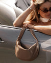Internal Features	2 Slip Pockets
Internal Lining	Polyester Recycled Black and White Stripe 100% Lining
Crossbody Strap	Adjustable and Non-Detachable 34-65cm Vegan Leather Strap
Closure	Secure Zip
Body Material	Polyurethane Vegan Leather 100%
Hardware	Light Gold
Dimensions	W29 x H15.5 x D10cm
Weight	0.3kg