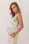 Matching shorts for your summer tops! 100% linen in the fresh Amalfi Dreams print in colours of lemon and blue, these mid length shorts have large front pockets, zip and button front, a flat band at the front and elastic at the back waist.