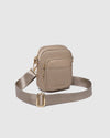 Internal Features	Slip Pocket
External Features	Front Side Slip Pocket, Front Side Zip Pocket
Internal Lining	Polyester Recycled Beige and White Stripe Logo 100% Lining
Crossbody Strap	Adjustable and Detachable 72-130cm Sateen Webbing Strap
Closure	Secure Zip
Body Material	Nylon 100%
Hardware	Light Gold
Dimensions	W13 x H19 x D7cm
Weight	0.35kg
