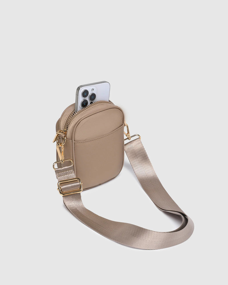 Internal Features	Slip Pocket
External Features	Front Side Slip Pocket, Front Side Zip Pocket
Internal Lining	Polyester Recycled Beige and White Stripe Logo 100% Lining
Crossbody Strap	Adjustable and Detachable 72-130cm Sateen Webbing Strap
Closure	Secure Zip
Body Material	Nylon 100%
Hardware	Light Gold
Dimensions	W13 x H19 x D7cm
Weight	0.35kg